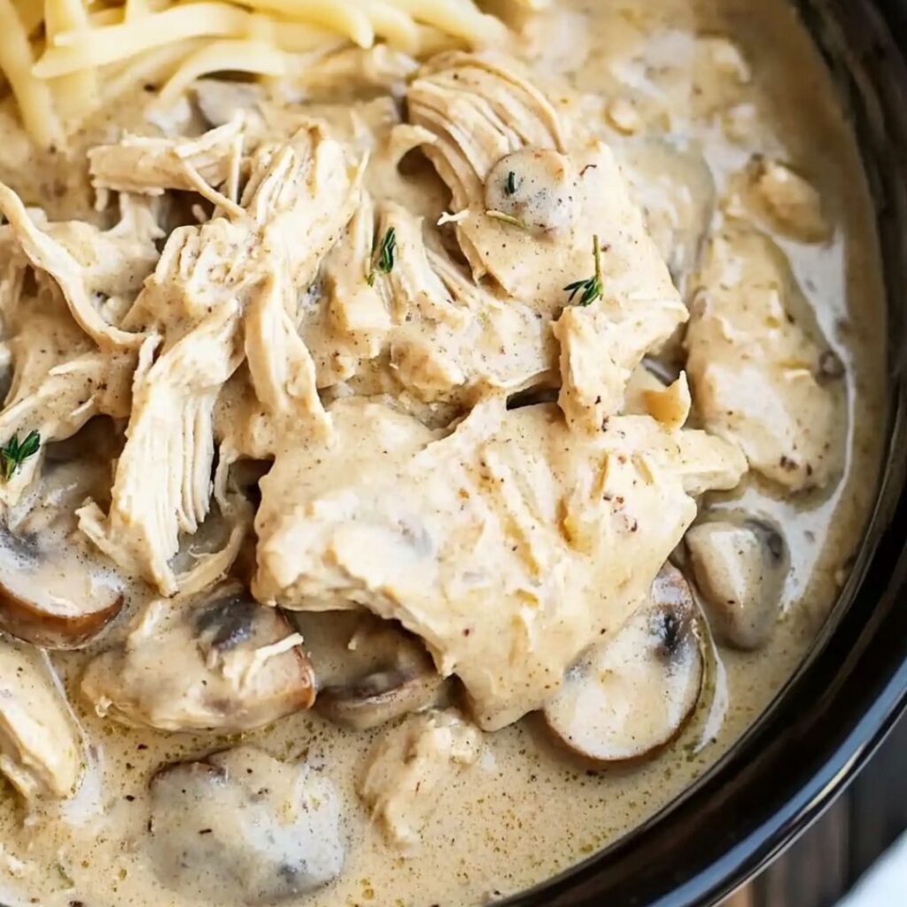 Chicken With Cream Of Mushroom Soup Slow Cooker 2 Ingredients for slow cooker chicken with cream of mushroom soup layered in a crockpot before cooking